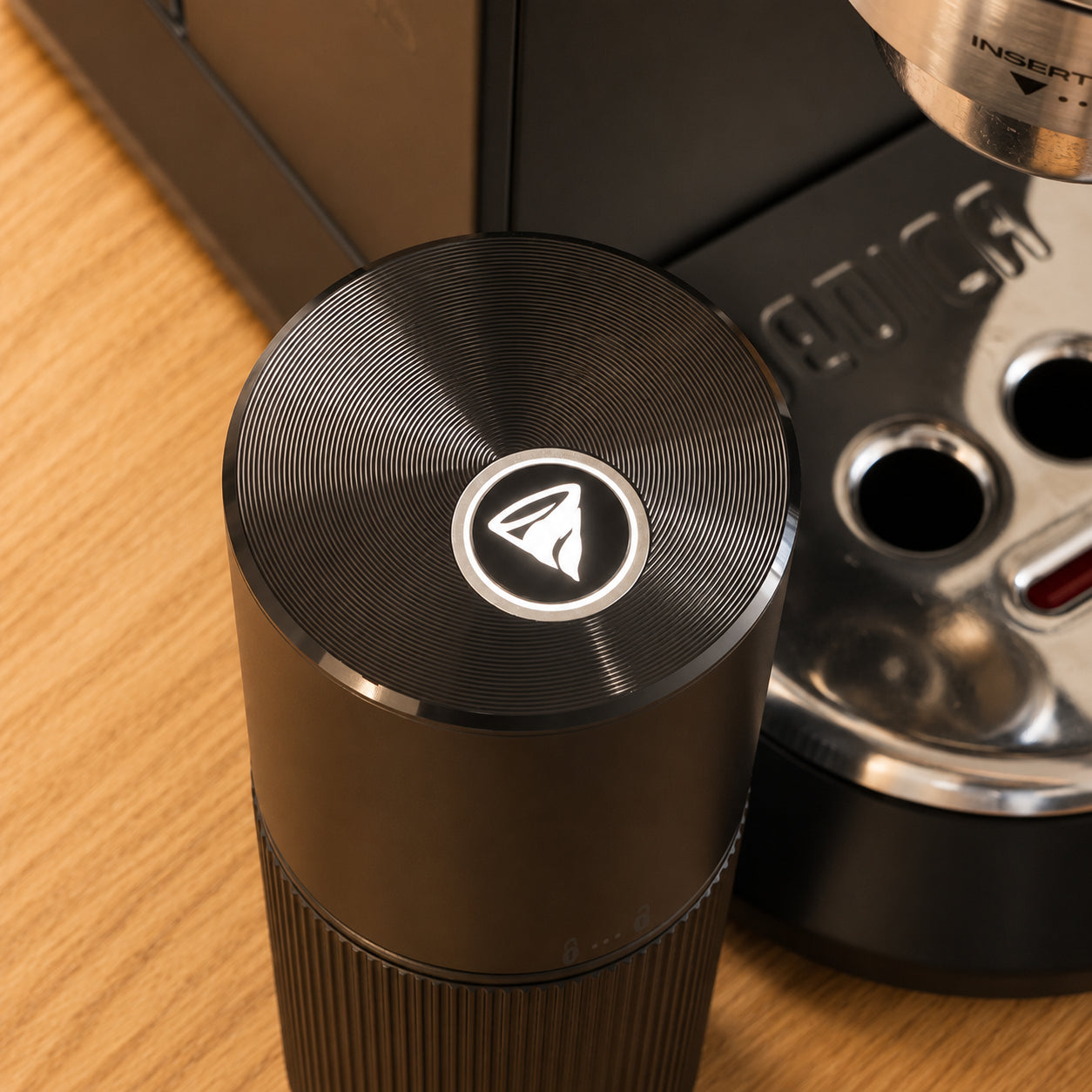Off-center power button on the Lopder MAXA electric grinder module